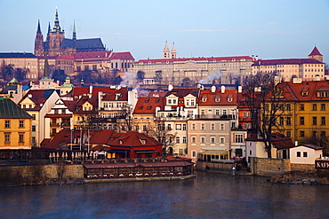 View over Vltava River towards Prague Castle in early morning