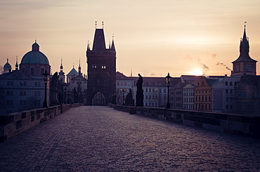 View over Charles Bridge towards Prague Castle in early morning