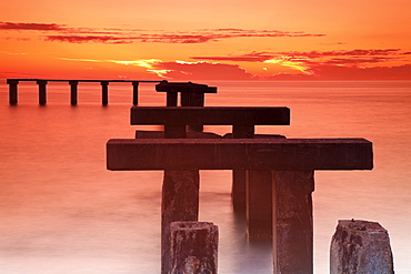 USA, Florida, Boca Grande, Ruined pier at sunset