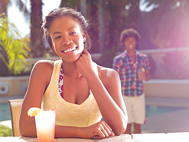 USA, Arizona, Scottsdale, Young couple at pool side bar