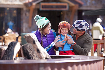 USA, Colorado, Telluride, Parents with son (4-5) at ski resort