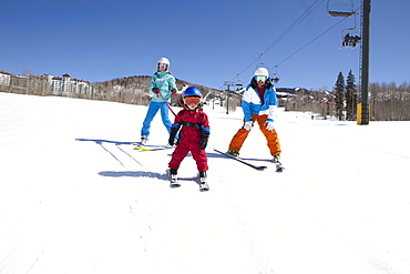 USA, Colorado, Telluride, Family skiing together