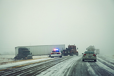 USA, Illinois, Springfield, Semi truck accident on highway during storm