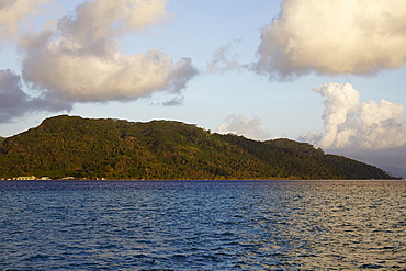 Cloudy sky above islands in sea, French Polynesia, Raiatea