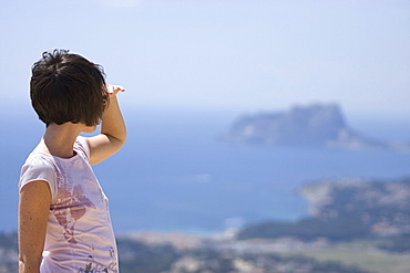 Spain, Costa Blanca, Woman looking at seascape