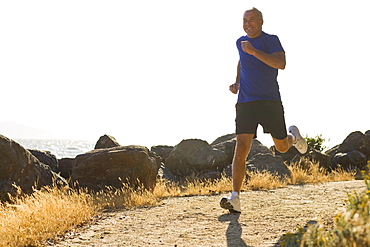 USA, California, Berkeley, Senior man jogging