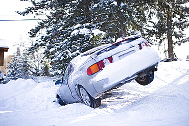 USA, Montana, Car buried in snow