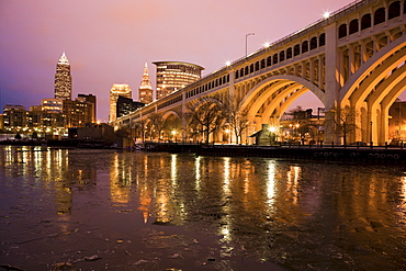 USA, Ohio, Bridge crossing Cuyahoga River at dusk Cleveland