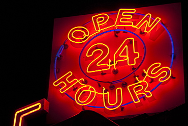 Illuminated open 24 hours sign