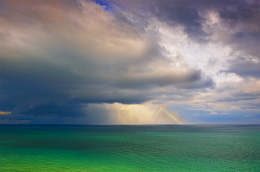 Rainbow over ocean