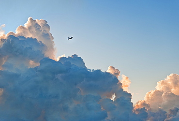 Clouds and airplane