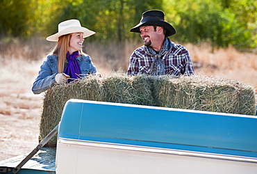 Lifting bales of hay