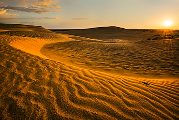Sunrise over sand dunes, Lake County Oregon