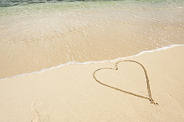 Heart drawn in sand