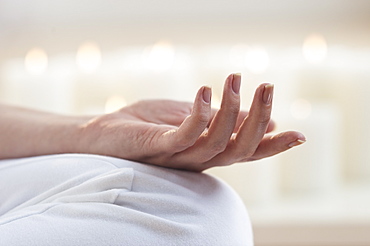 Close-up of woman's hand knee