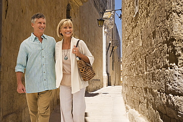 Tourists walking in alley