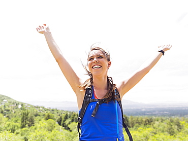 Portrait of athletic woman cheering, USA, Utah, Salt Lake City 