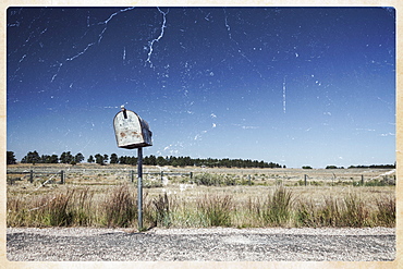 Old mailbox by rural road, Wyoming