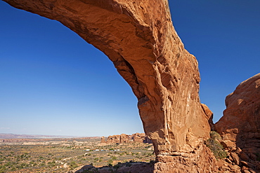 Close up of natural arch against clear blue sky, USA, Utah, Arches National Park, Moab