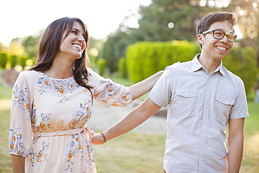 Couple hanging out in park, Salt Lake City, Utah