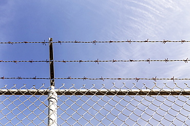 Low angle view of chainlink fence