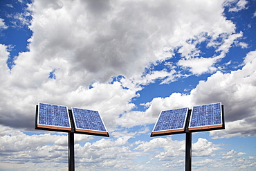 Two solar panels on sky background