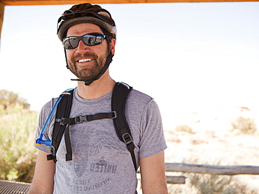 Mid adult man posing in cycling gear