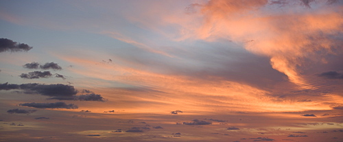 Sunlight from behind clouds