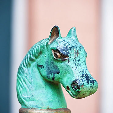 Iron statue of a horse's head