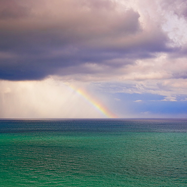 Rainbow over ocean