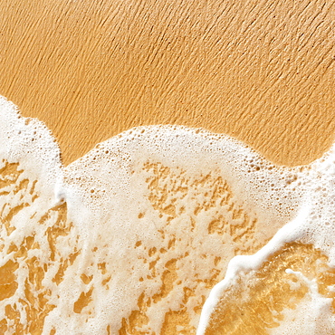 Sea waves on beach sand