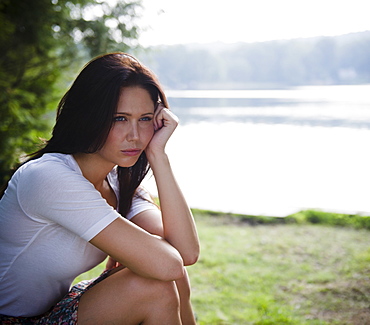 Roaring Brook Lake, Lonely woman sitting by lake