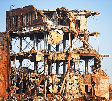 Demolished building under blue sky