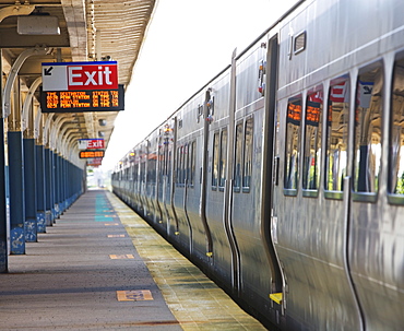 Commuter train parked at station platform