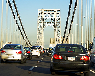 Cars moving across George Washington Bridge, New York