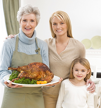 Multi-generational female family members at Thanksgiving