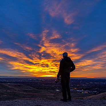 Silhouette of senior man at sunset