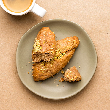 Greek honey and pistachio cookies on plate 