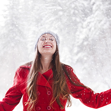 Happy woman outside on a snowy day