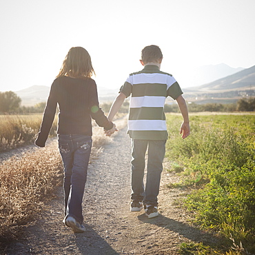 Young children walking on path