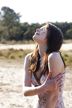 Belgium, Kalmthoutse Heide, Portrait of young woman, Kalmthoutse Heide (near Antwerpen), Belgium