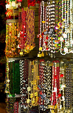 Mardi grass beads on display in a store in New Orleans