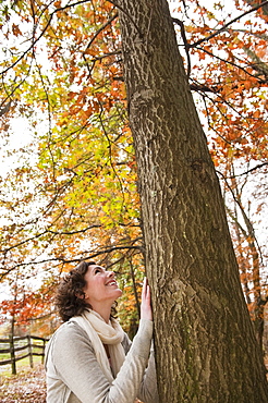 Woman looking at tree