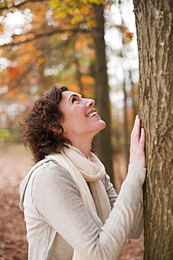 Woman looking at tree