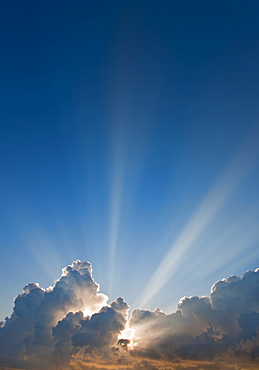 Sunset behind clouds