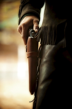 Cowboy with gun in holster