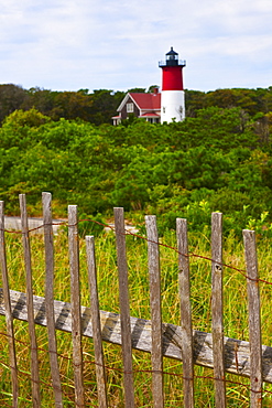 Fence in front of lighthouse