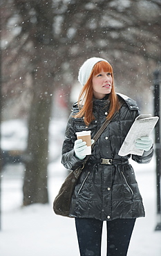 Woman walking in snow