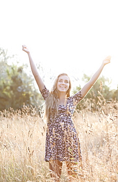 Outdoor portrait of happy teenage girl (16-17) 