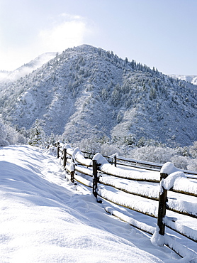 USA, Colorado, snowy ranch with pen